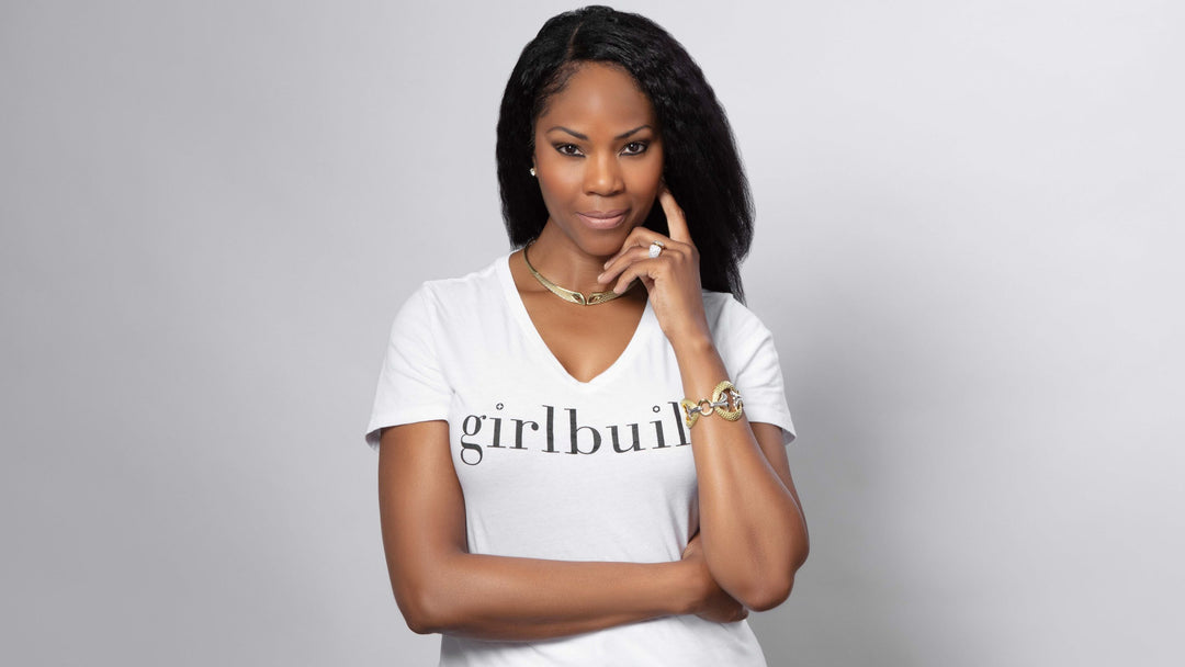 Monica Miraglilo, founder of GirlBuild, wears REALM Fine + Fashion Jewelry