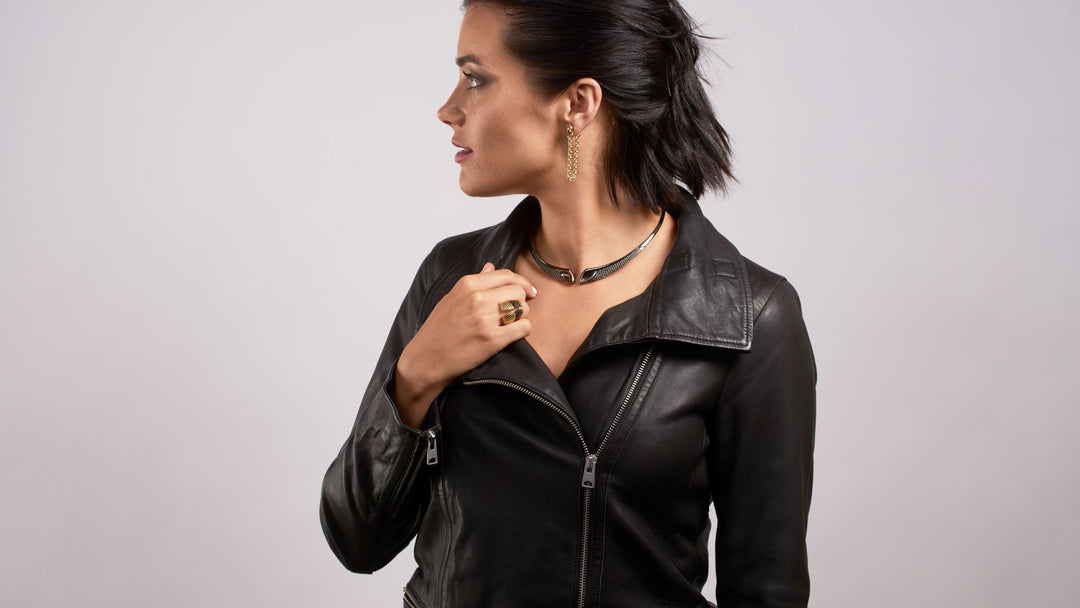 Woman in black leather wears Black Ruthemium jewelry from REALM